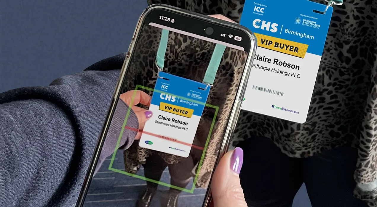 Person having their badge scanned using the LeadReference mobile app on a smartphone
