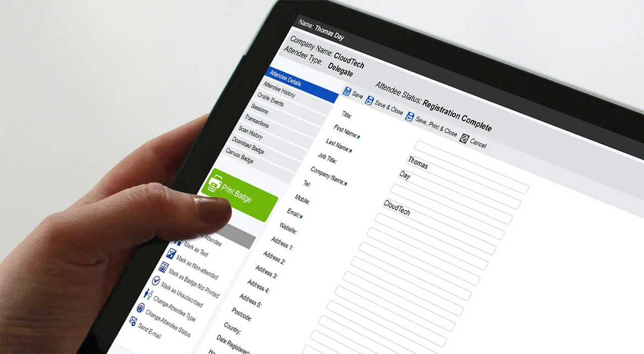 Person using a mobile device to print badges