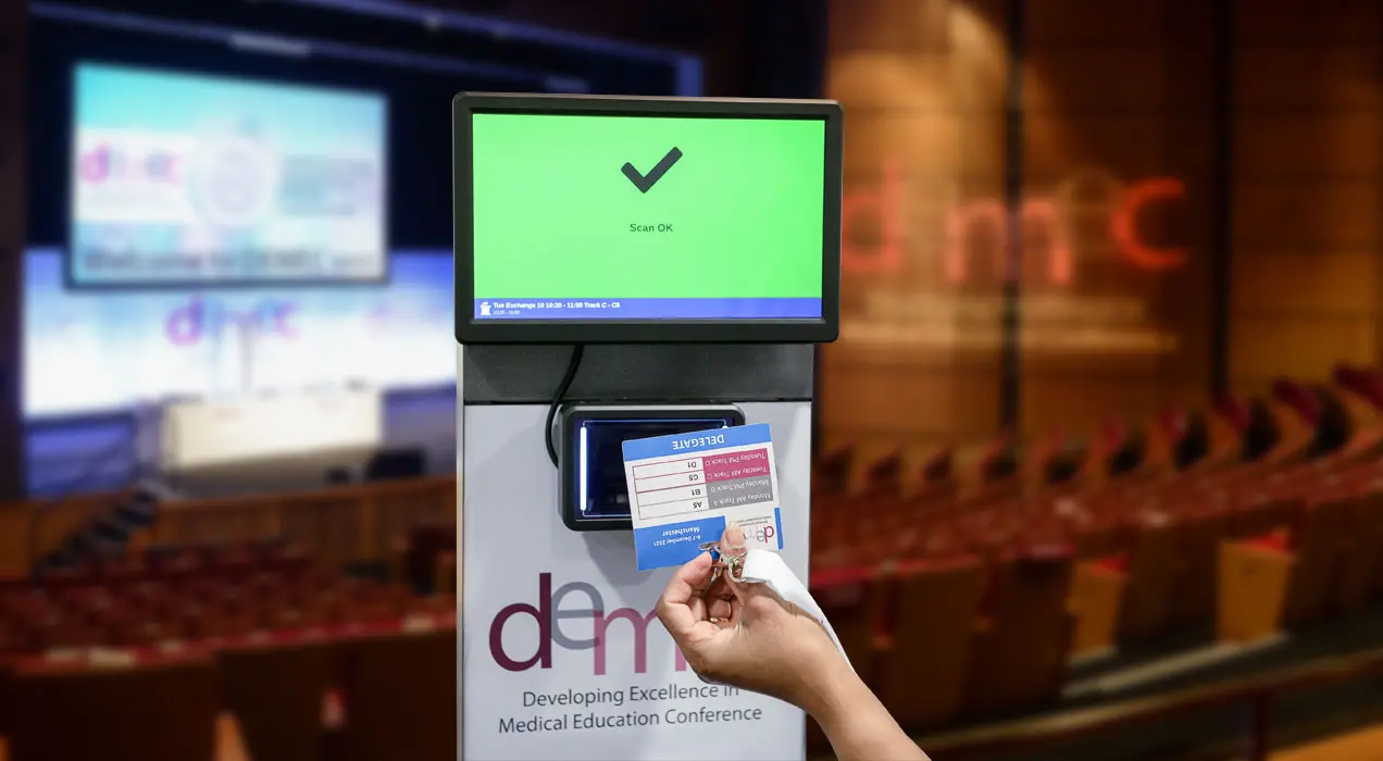 Person scanning their badge at a ScanPod